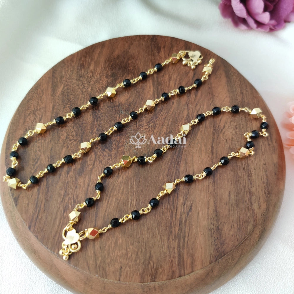 Black beads with gold beads anklet