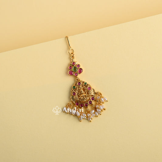 Glazing Laxmi Tikka